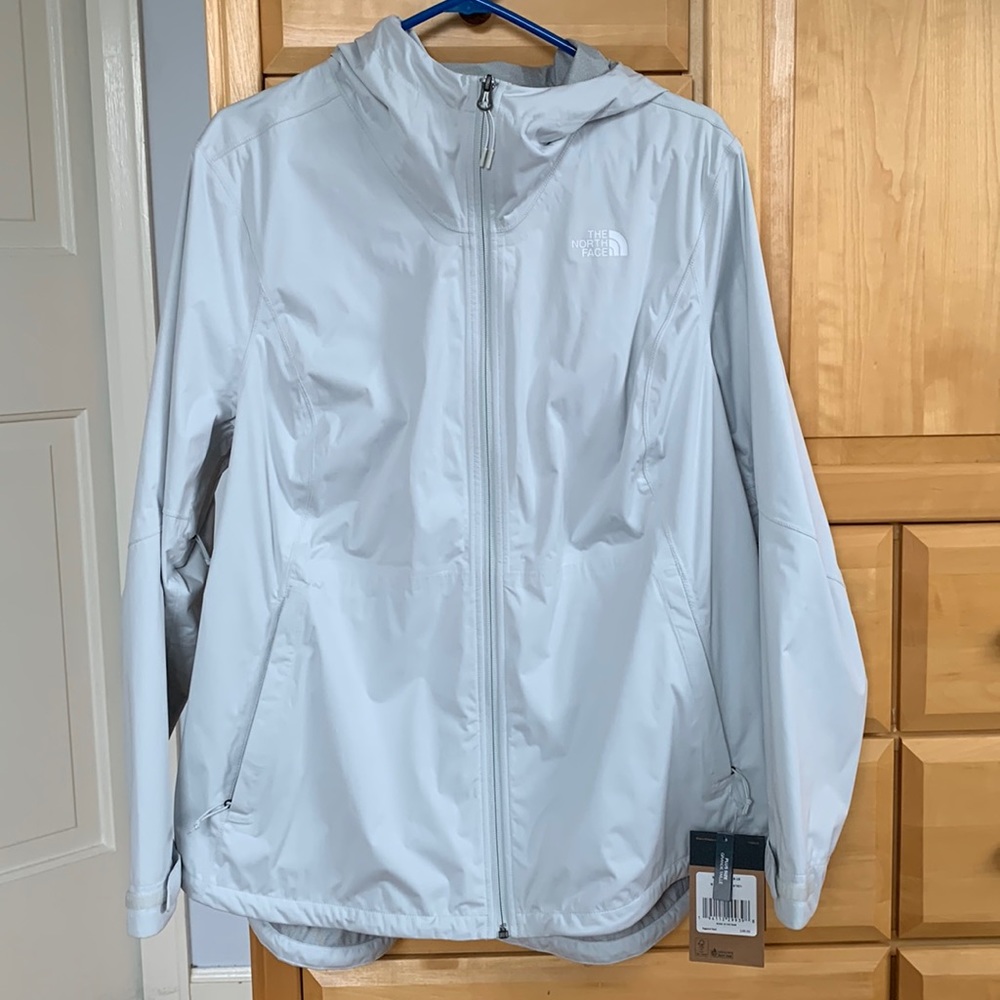 New with tags women’s North Face rain jacket. 1X